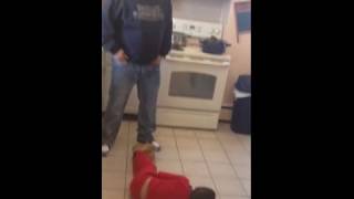 Young Boy Bounces Off Mans Stomach and Falls