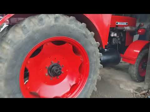 Video: Cum aflu în ce an este tractorul meu internațional?