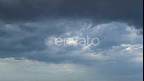 Thundercloud Moves Across a Cloudy Sky | Stock Footage - Envato elements