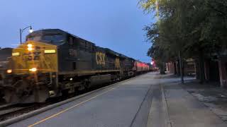 CSX 5420 and CSX 5240 lead a sb mixed freight and CSX 5319 and CSX 976 lead a sb grain train 
