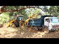 JCB 3DX Backhoe Making Road and Loading Mud in Dump Truck