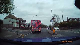 Tesco delivery driver  ignores road sign and traffic Island.