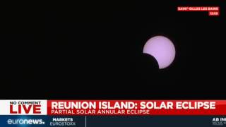 People across Reunion Island witness partial eclipse of the sun
