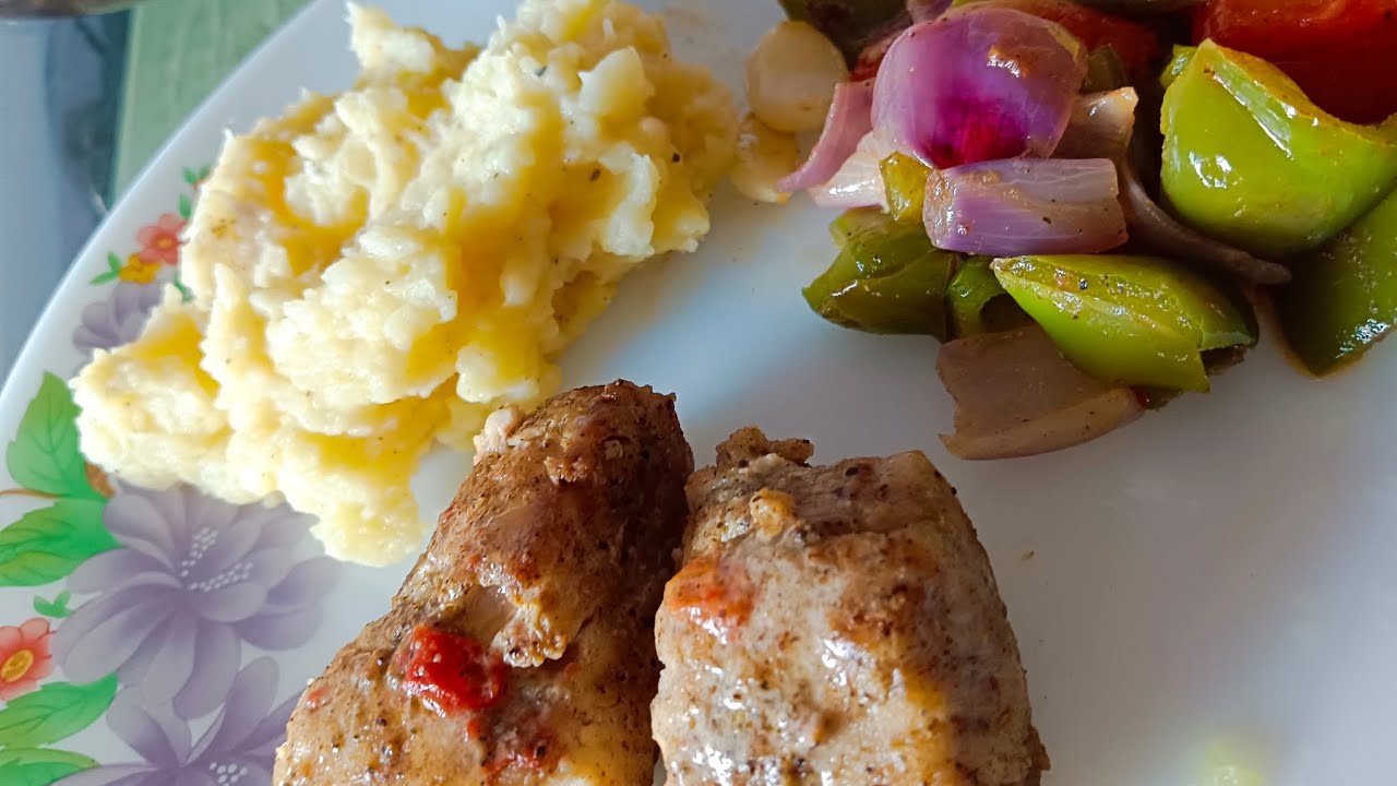 Pan-seared Fish with vegetables and mashed potatoes.