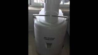 Juicing Raw Vegetables Into Ice Cube Tray For Smoothie Supp