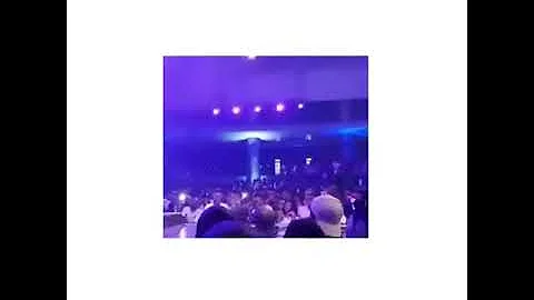 “Fan thrown off stage for trying to touch Wizkid during a performance,