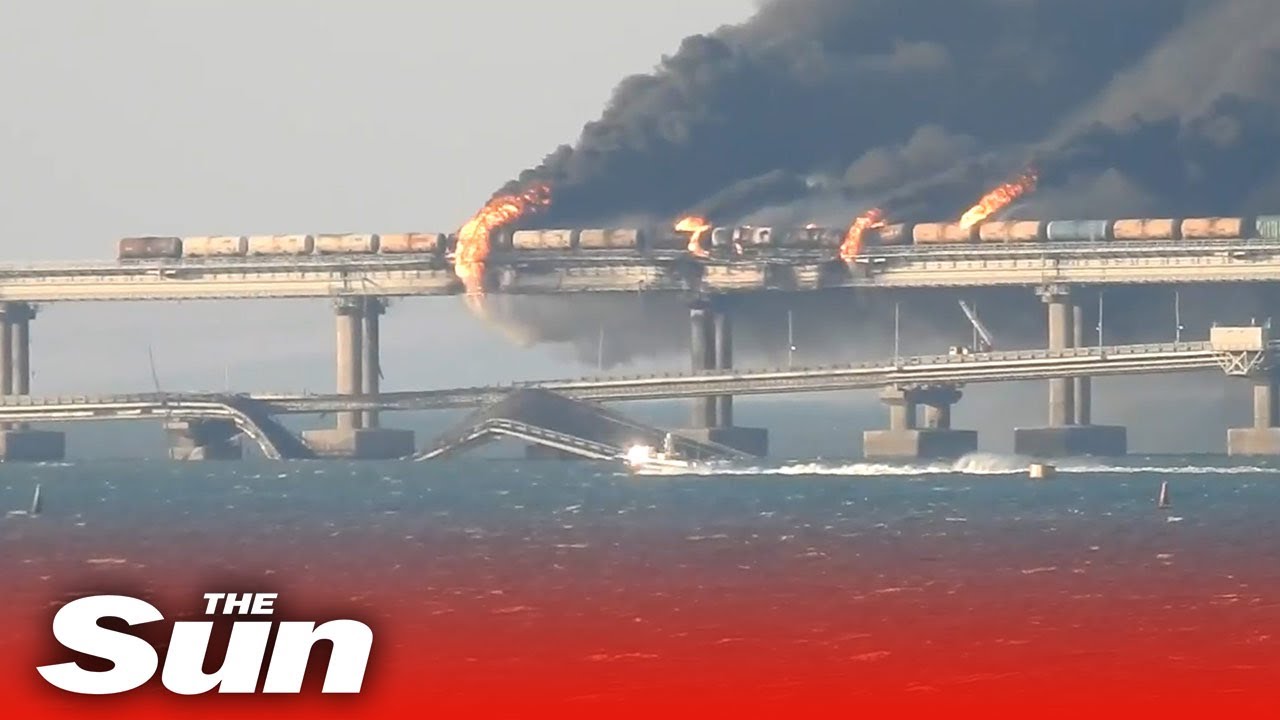 Fire rages on after blast on Crimea bridge as Russia launches investigation | The Sun | October 8, 2022