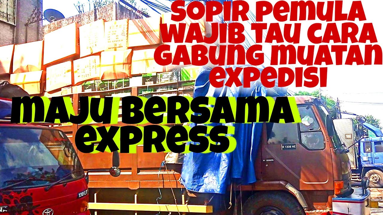  Truk  Fuso  Fighter  muat paket expedisi MAJU BERSAMA EXPRES 