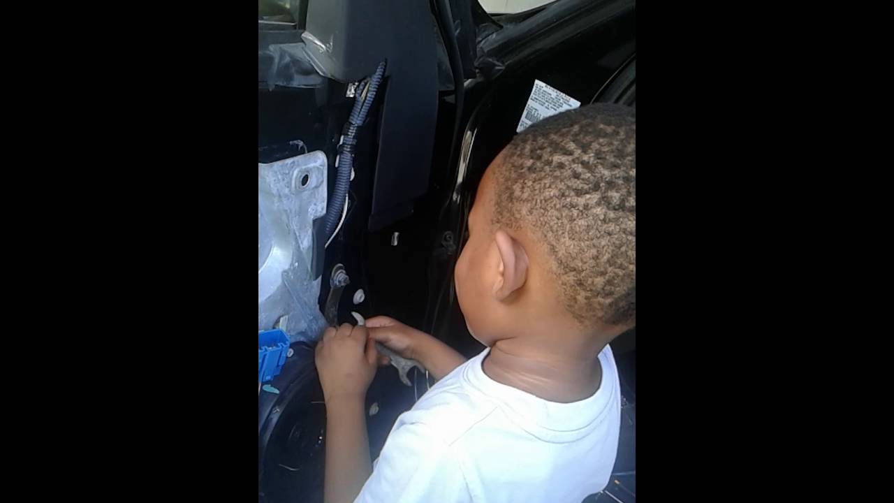 Maycent mackey fixing his dad car