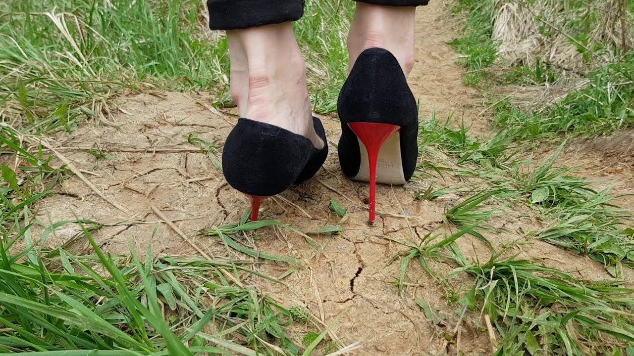 dirty high heels, high heels stuck, oversize high heels sinks in ground ...