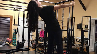 Pilates Cadillac Trapeze Table Standing Spread Eagle prep at SOMA Movement Studio