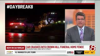 Car crashes into fence at Crown Hill Funeral Home