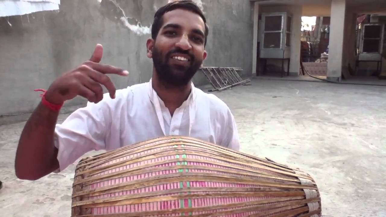 Sadacari Prabhu from Delhi teaches how to play fast 2 tall beat for Bhajans.