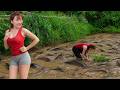 Harvesting Giant Fish by Hand: A Bountiful Day for a Hardworking Mountain Girl