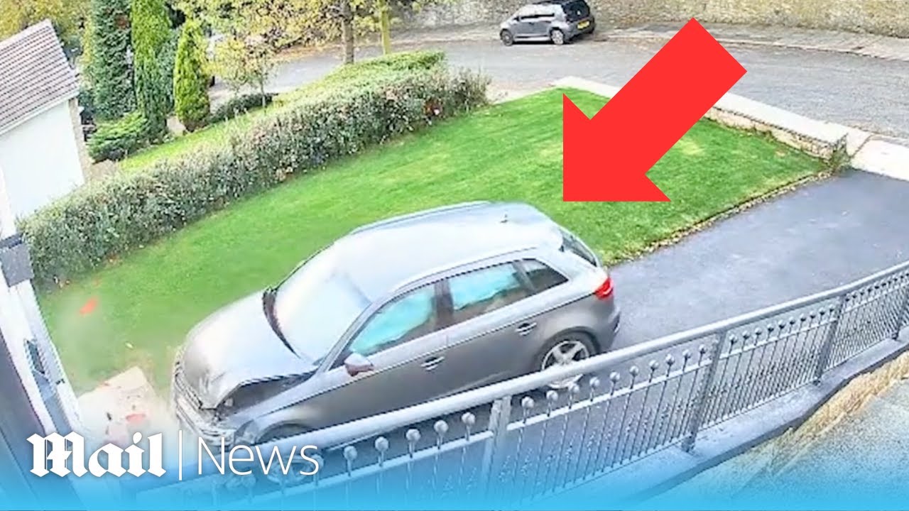 Shocking moment Audi attempting a U-turn crashes into house while ...