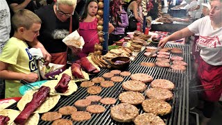 Street Food of Serbia. Burgers and Sausages on Grill. Rostiljijada Grill Festival, Leskovac