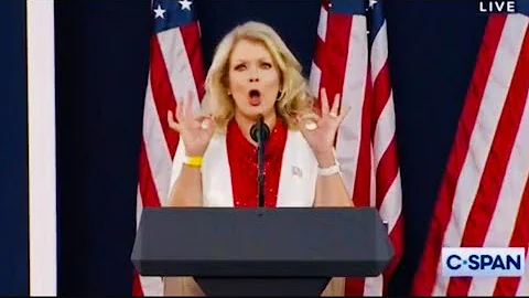 Mary Hart throws up white power symbols at rally
