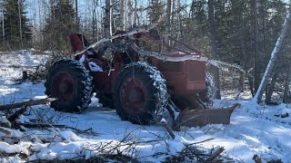 230 Timberjack logging trees and tree snaps when frozen