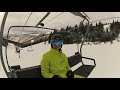 Skier on ski lift perspective