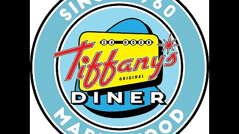 Dan Turnbaugh, singing his original song "Rain," at Tiffany's Original Diner.