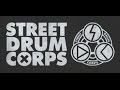 Street Drum Corps | The History