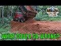 Renting Volvo 140 and Dump Truck to work on homestead road base project