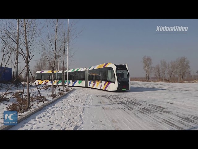 China tests smart electric train running on virtual tracks in frigid weather class=