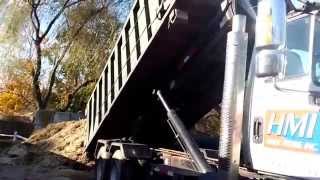 HMI dropping a 30 yard roll off container