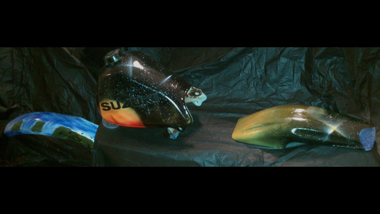 Suzuki motorcycle custom painted using Rustoleum spray paint. "Spray