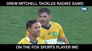 Drew Mitchell mic'd up with earpiece for banter with commentators