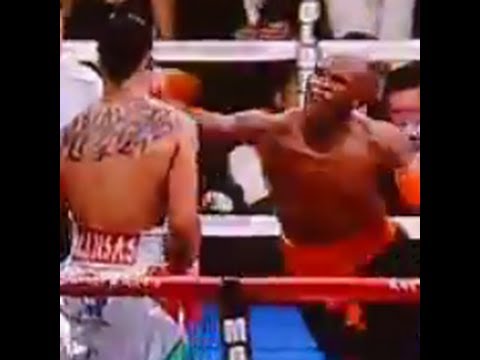 Floyd Mayweather Sucker Punches Victor Ortiz