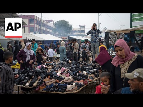 Palestinians flee to overcrowded refuges as Israel expands offensive in Gaza