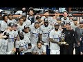 The dallas mavericks receive the oscar robertson trophy as the nba western conference champions