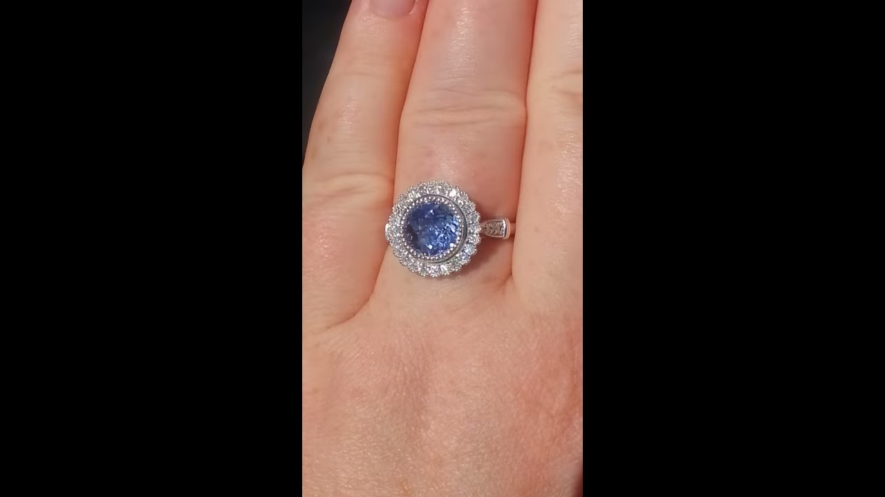 Cornflower Blue Sapphire In White Gold Milgrain Bezel Diamond Halo Gerbera Engagement Ring