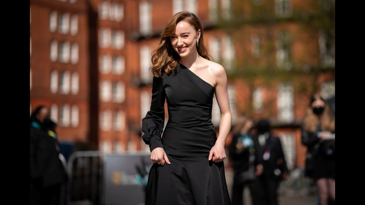 Phoebe Dynevor in a one shoulder Louis Vuitton gown at the BAFTAS