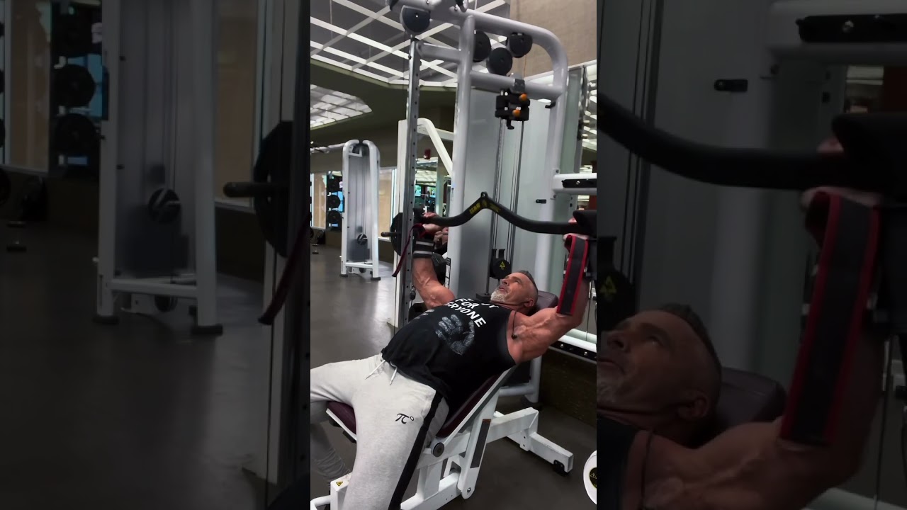Try these incline presses in the crossover cage using the lat pulldown bar as your handle. #fit