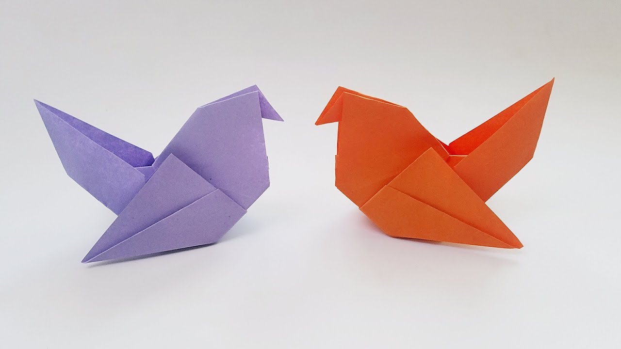 Легкая птичка из бумаги. Оригами птичка. Бумажная птица оригами. Оригами птичка из бумаги для детей. Птичка оригами легкая.