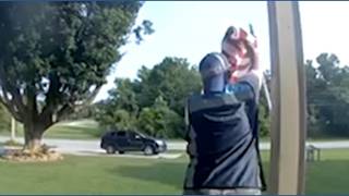 Amazon driver untangles American flag, then stops to salute