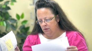 Judge orders defiant Kentucky clerk to jail