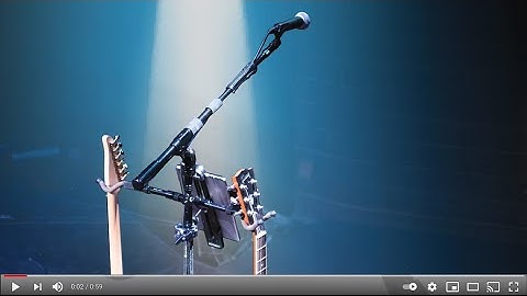 One Solution Video, One stand holding Mic, 2 guitars, tablet, cue mix amp.