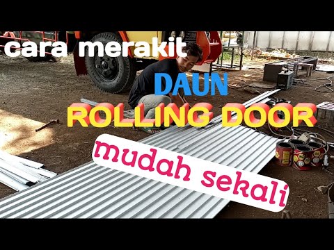 Proses Cara  merakit  daun  rolling door untuk toko garasi 