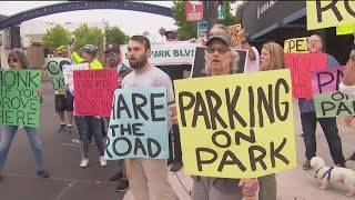 Residents and business owners protest new bike lanes along Park Boulevard