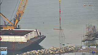 'The Barge' English Bay Vancouver, a Titanic moment, raising the last remnants of the barge hull.