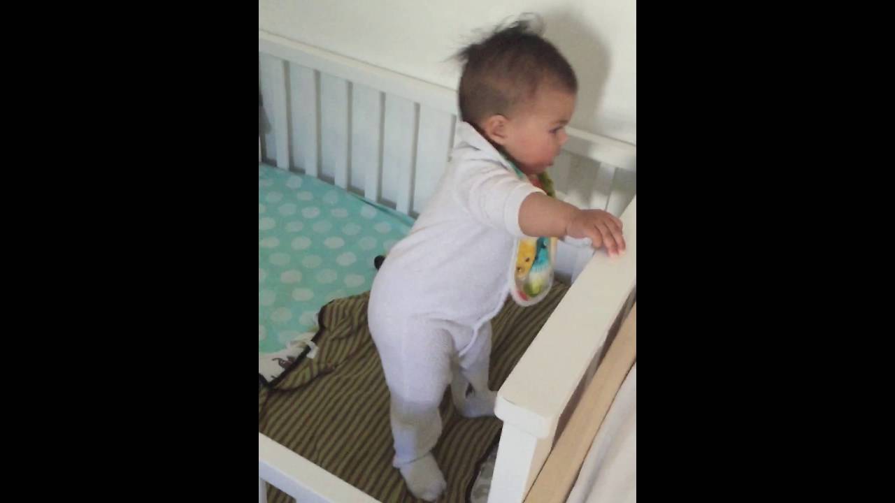 baby standing at 2 months