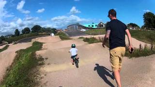 Kid rides BMX track for the first time
