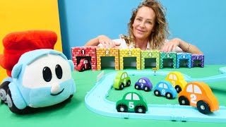 Leo der Lastwagen - Nicole baut für die Spielzeugautos eine Rennbahn - Zahlen Lernen leicht gemacht