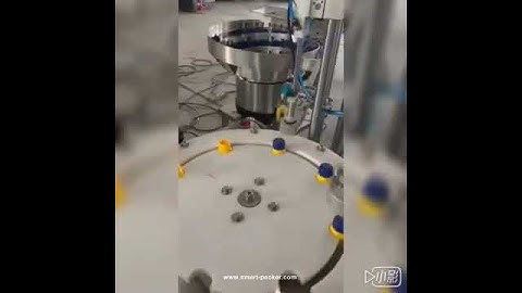 Essential oil small bottle cap loading screw capping labeling machine testing video