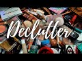 Declutter my makeup collection with me  lets get rid of some makeup collection clean out