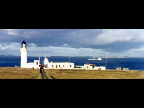 Lighthouse And Buildings With Music On History Visit To Island of Stroma Pentland Firth Scotland