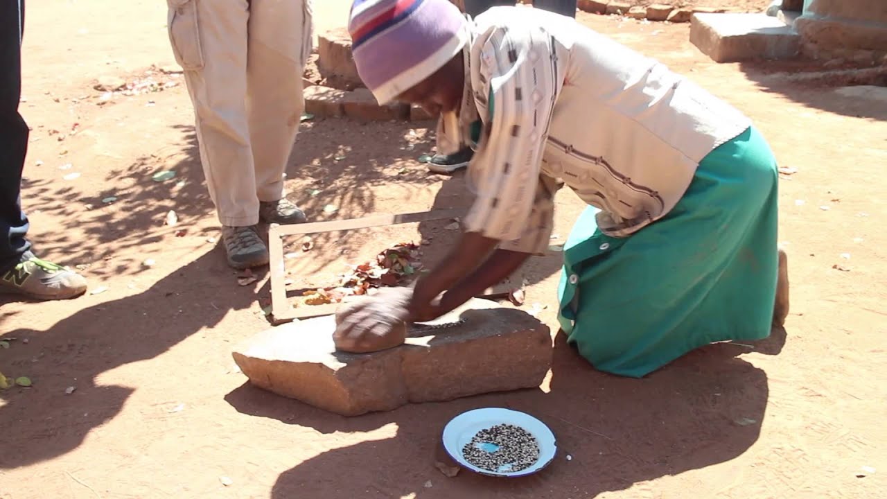 Grinding Corn Using Rocks YouTube
